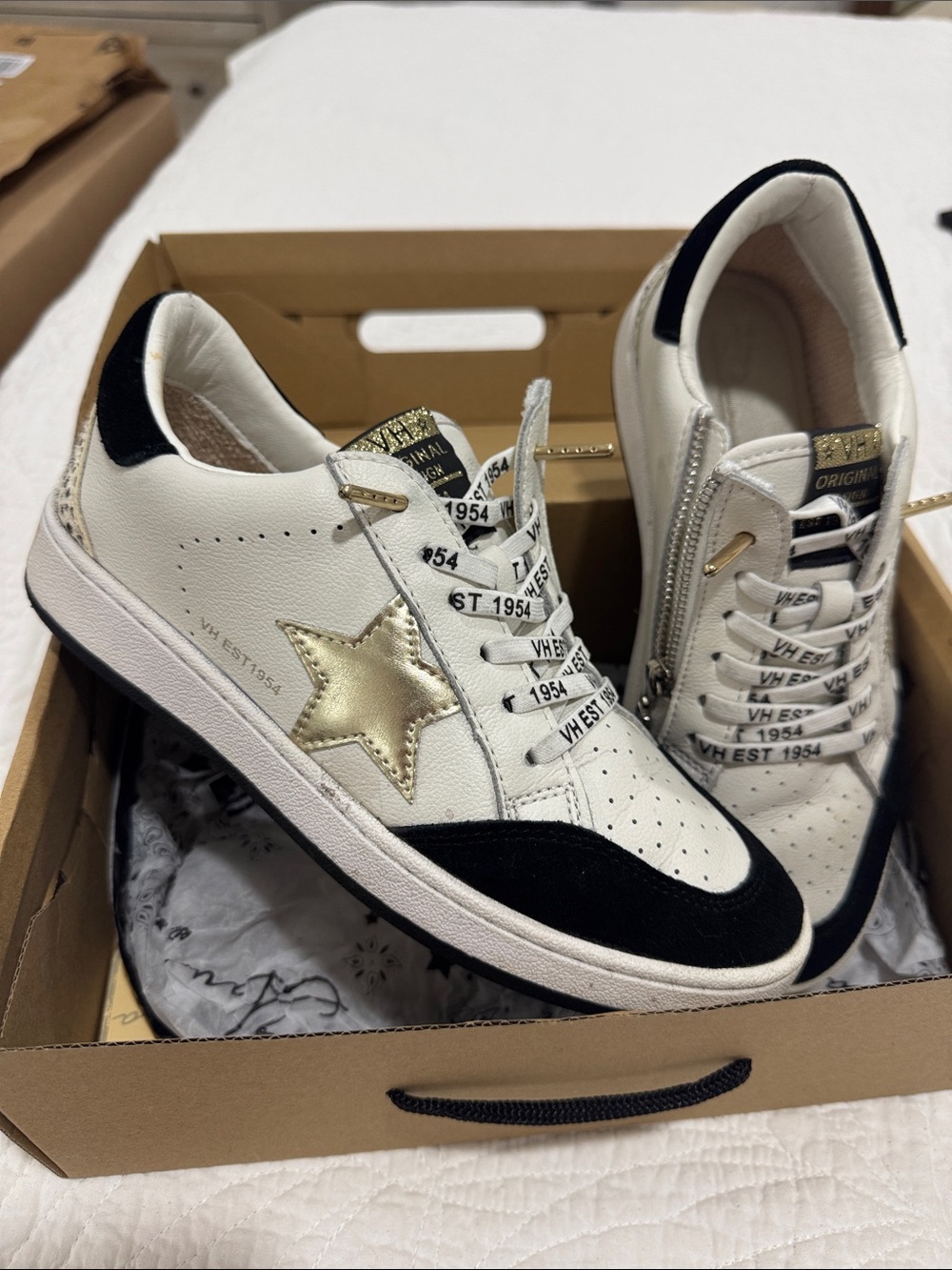 Vintage Havana White Sneakers with Black Trim and Gold Star